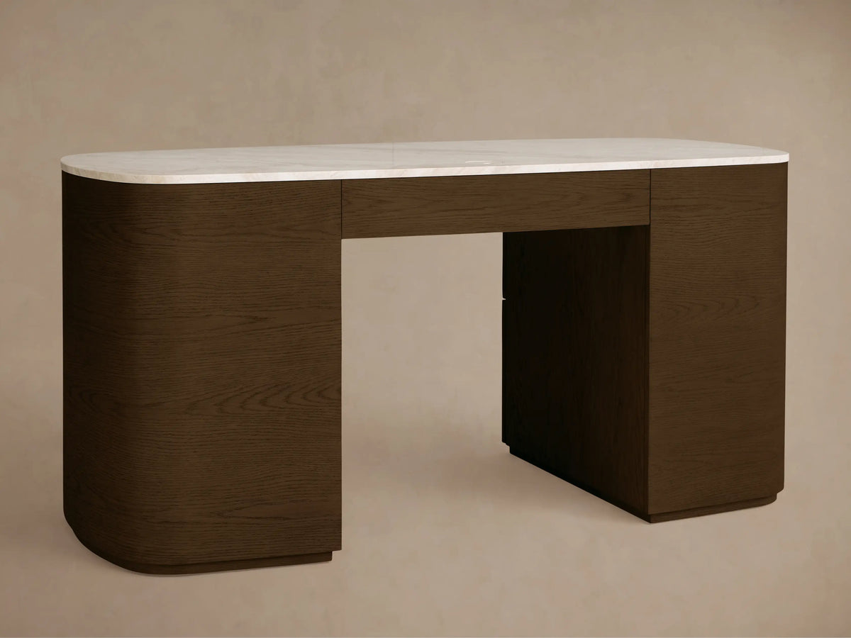 Front view of the Danny Executive Desk, featuring a white Carrara marble top and dark brown oak veneer base with curved sides.