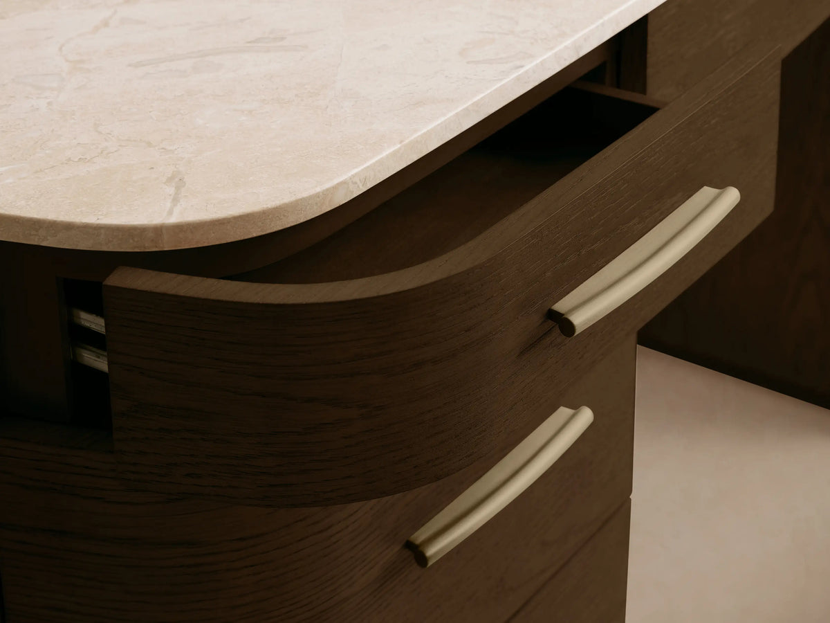 Front view of the dark brown oak veneer Danny Executive Desk with a white Carrara marble top and seven gold handles.
