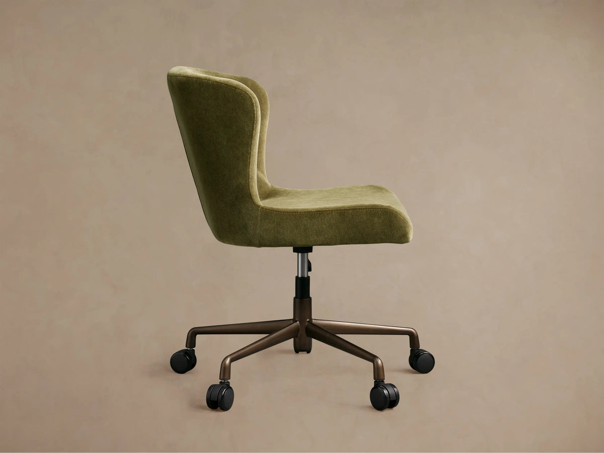 Kirsten Desk Chair, olive green upholstered with high back, from rear. Dark bronze powder-coated 5-star base, casters, hydraulic lift.