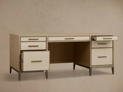 Front view of a Bone Malone Executive Desk with off-white shagreen leather drawer fronts and dark steel legs.