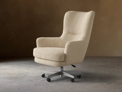 Montrose Desk Chair, light beige boucl??, high back, integrated arms, brushed metal 5-star caster base.