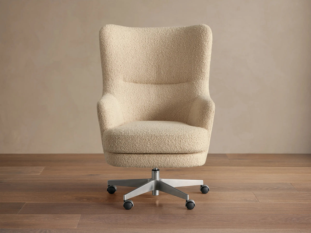 Montrose Desk Chair, light beige boucl??, high back, integrated arms, brushed metal 5-star caster base.