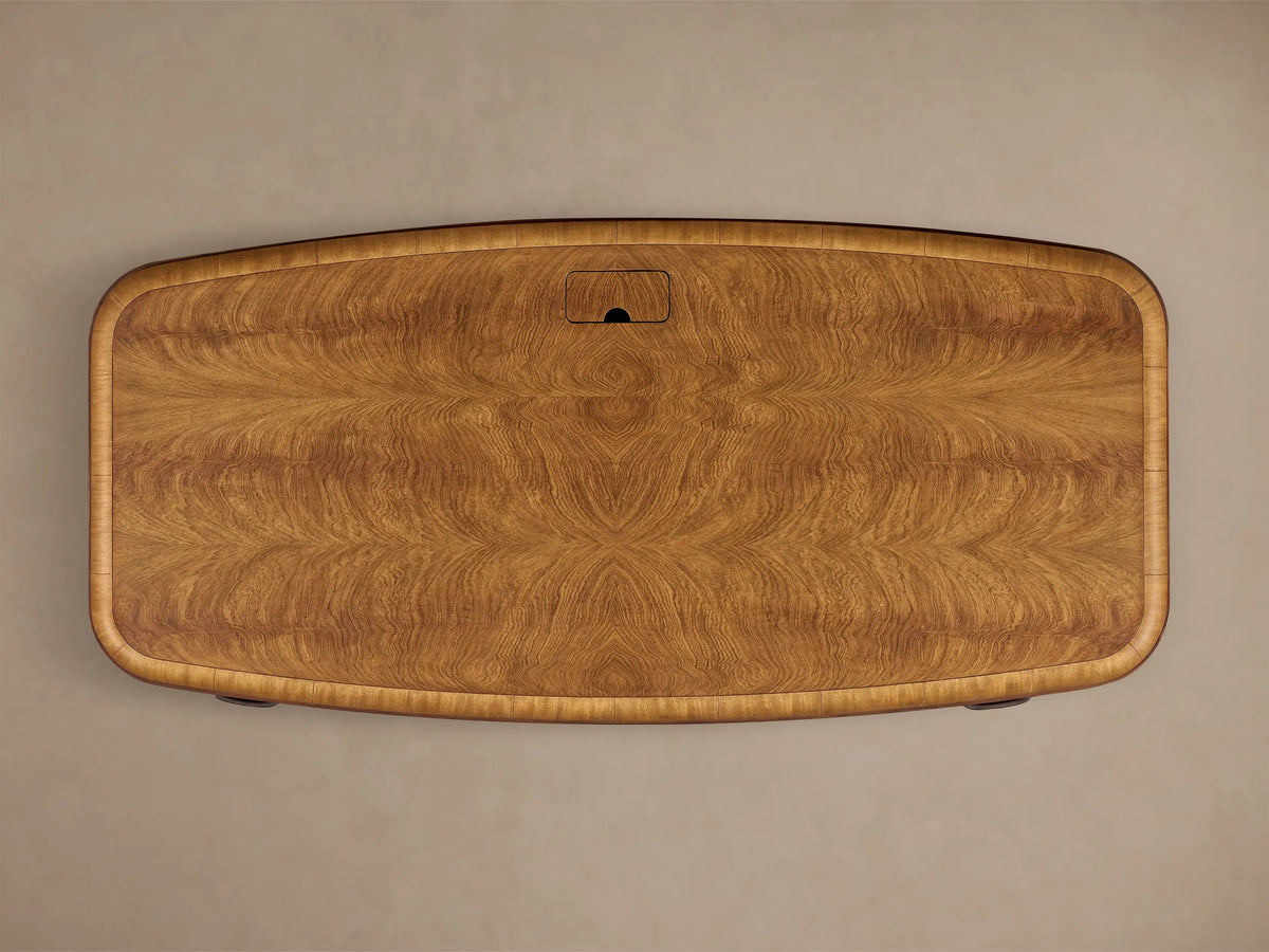 Front view of the brown Palma Executive Desk, showcasing cerajeira wood veneers with cathedral graining and rounded corners.