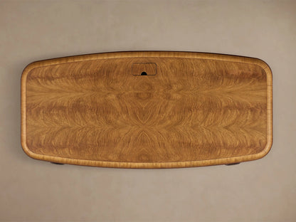Front view of the brown Palma Executive Desk, showcasing cerajeira wood veneers with cathedral graining and rounded corners.