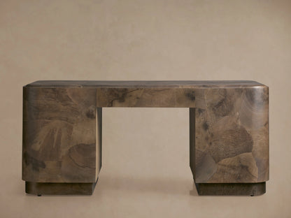 Polanco Executive Desk made of oyster-cut wood with unique graining, standing on aged steel base. Features a smooth top and push-to-open doors.