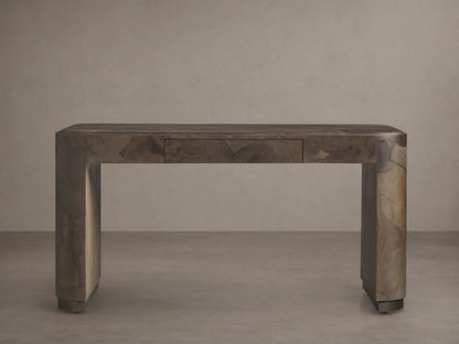 A rectangular Polanco Writing Desk crafted from oyster-cut salvaged wood with a natural finish. Features a center drawer and ledge detailing.
