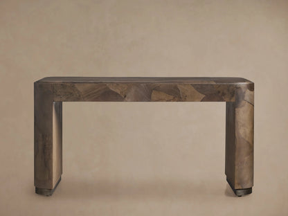 Polanco Writing Desk featuring a rectangular wooden top and legs with a varied brown oyster-cut wood pattern, set against a neutral background.