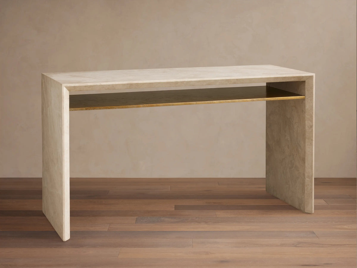 Sarsen Stone Desk in a minimalist design, with clean lines and a natural stone texture, on a wooden floor background.