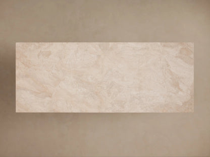 Sarsen Stone Desk corner view, showcasing smooth beige stone texture and a gold-toned inner shelf. Elegant and minimalist design.