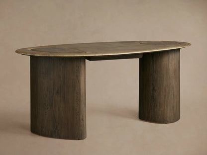 Sucurro Writing Desk, close-up. Organic light brown oxidized aluminum top with recessed wood, dark wood base. Drawer slightly open.