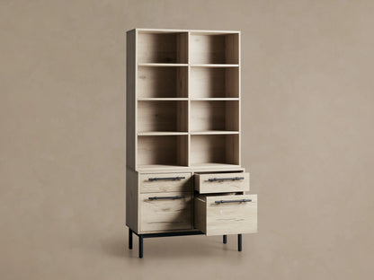 Sullivan Bookcase with File Base shown in light wood finish with four shelves above two drawer cabinets, black iron handles, on wooden floor.
