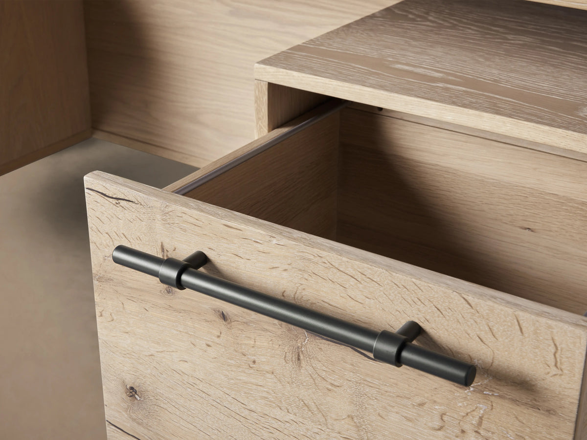 Sullivan Executive Desk in light oak finish with black iron handles and legs, featuring two drawers on left, large file drawer on right.
