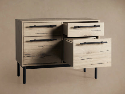 Sullivan File Cabinet in Northman Oak finish, featuring four drawers with black iron handles, displaying natural wood grain and cracks.