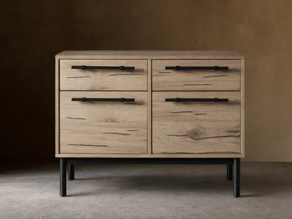 Sullivan File Cabinet in Northman Oak finish, showing four drawers with black iron handles, wood grain, and natural weathering details.