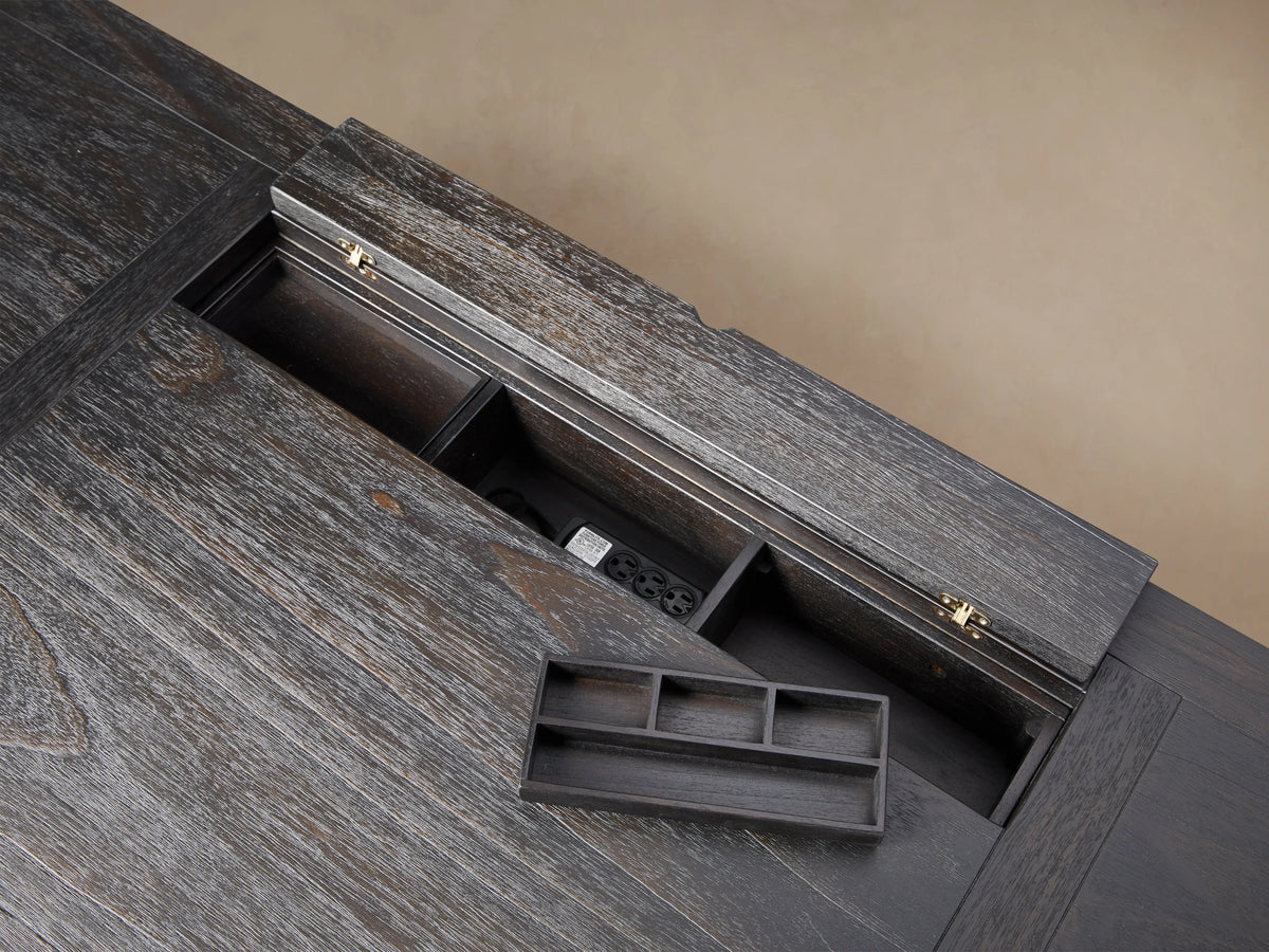 Telegraph Executive Desk made of dark mindi wood with brass hardware, featuring multiple drawers and a large central leg space.