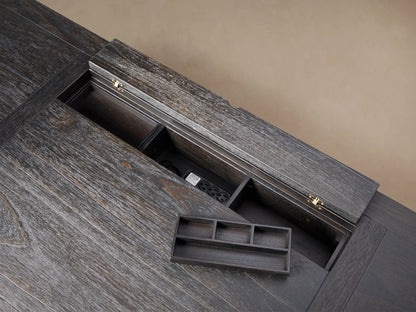Telegraph Executive Desk made of dark mindi wood with brass hardware, featuring multiple drawers and a large central leg space.