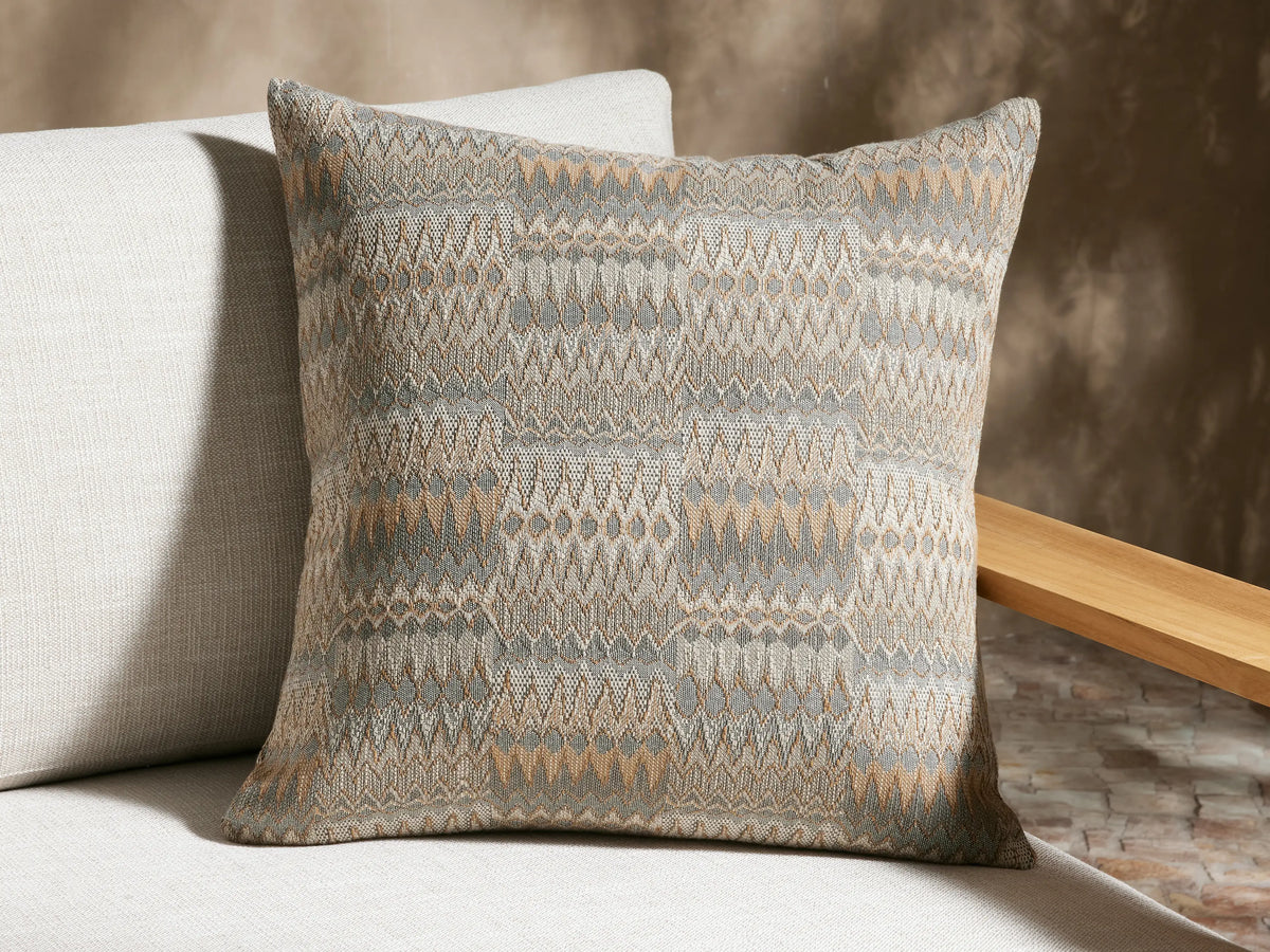 Naya Outdoor Pillow, square, textured jacquard in light gray, cream, and tan geometric zig-zag pattern.