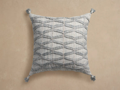 Mesa Outdoor Floor Pillow: Square, light gray with raised textured diamond pattern and tassels on each corner.