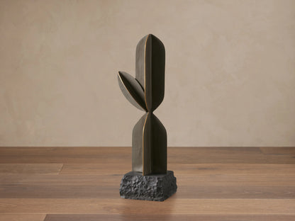 Ivy Green Cactus Sculpture: Dark green modern abstract sculpture with antiqued brass trim, on a dark textured rock base.