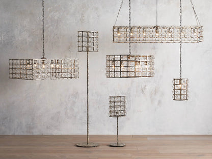 La Cage Pendant chandelier with iron cage, antiqued metallic finish, and Italian crystal spheres, hanging from a long chain.