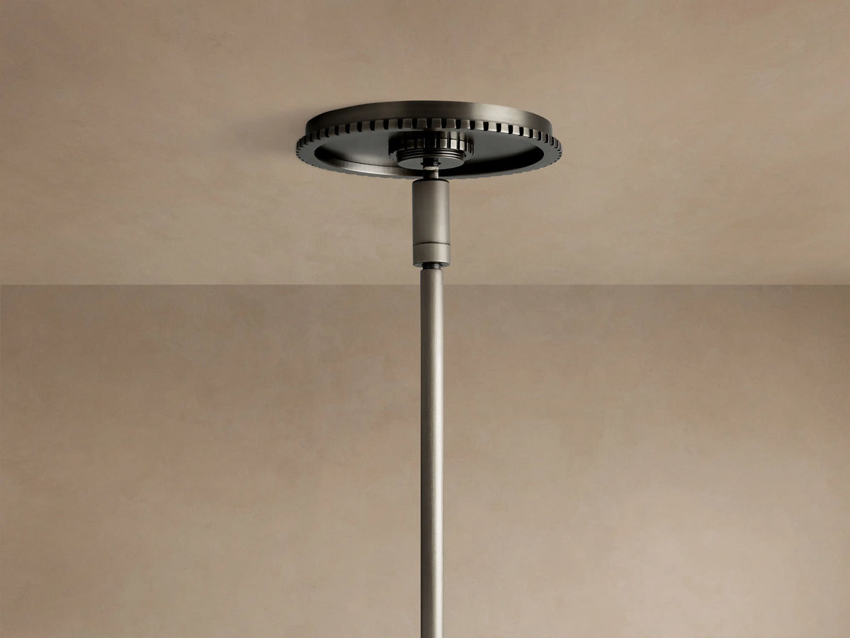 Wescott Globe Pendant: Close-up of a white milk glass globe and dark bronze etched metal ring with rod.