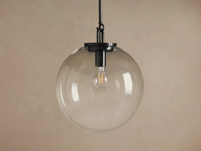 Wescott Globe Pendant with Rod, featuring a large clear glass globe, dark bronze rod, and an exposed filament bulb.