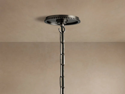 Wescott Globe Pendant: Close-up of white glass globe, dark brushed metal ring with ridges, and chain connection.
