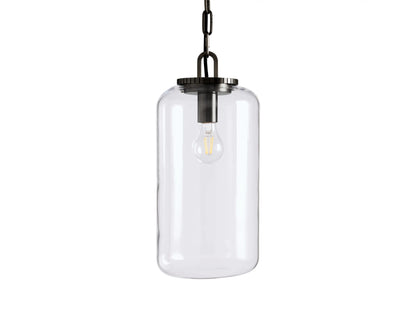 The Wescott Cylinder Pendant features a clear glass shade with metallic accents, showcasing a visible bulb, suspended by a chain.