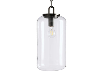 Wescott Cylinder Pendant with a clear glass shade, displaying visible bulb, suspended by black chain and metal fixture.