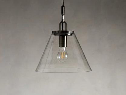 Cone-shaped clear glass pendant light with a visible bulb inside, suspended by a chain and metal fixture against a neutral background.