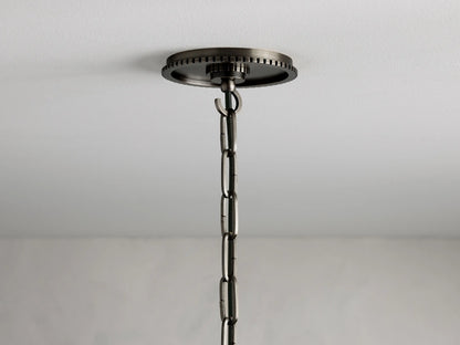 Wescott Cone Pendant with a close-up view of a clear glass shade and brushed metal fitting, showcasing elegant design details.