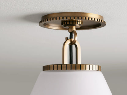 Wescott Cone Flush Mount with brass finish, featuring a large white milk glass cone shade, mounted on a ceiling.