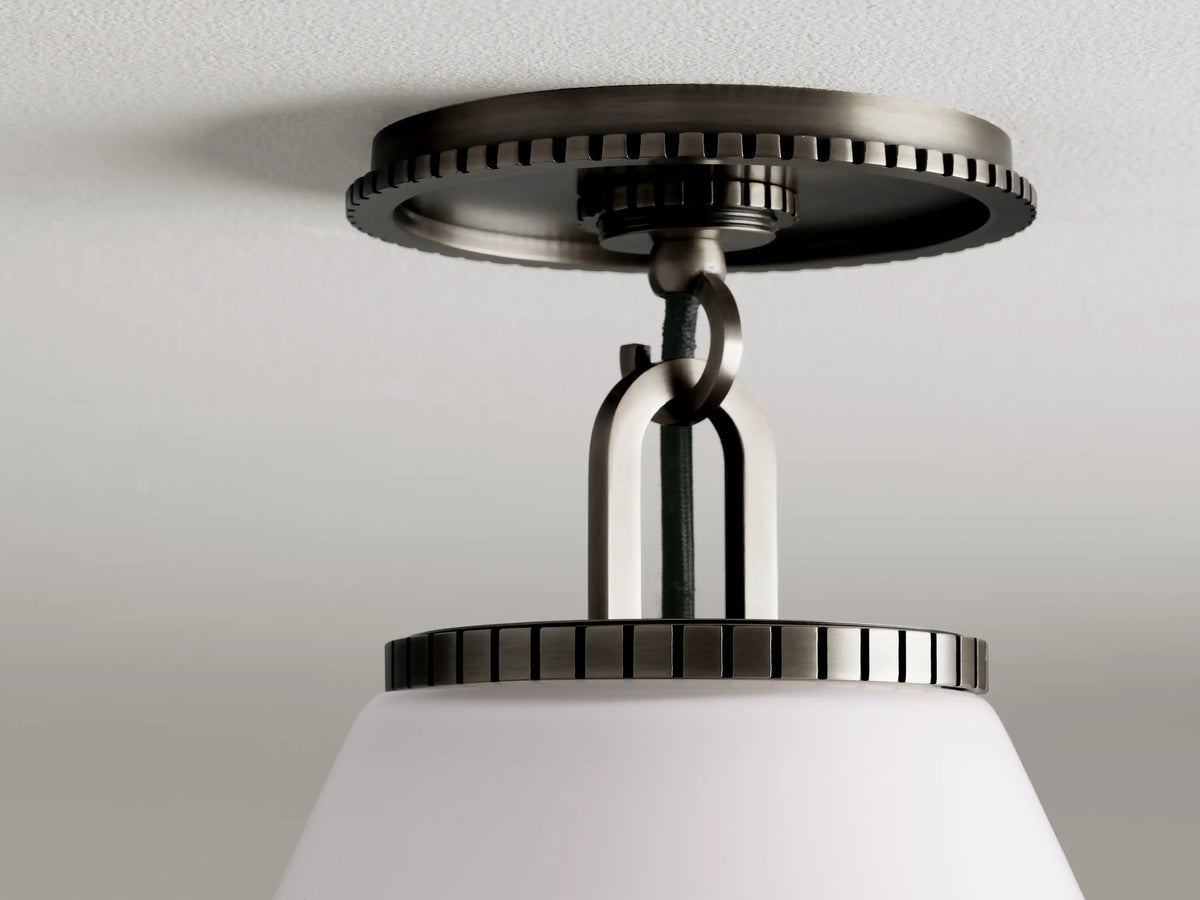 The Wescott Cone Flush Mount features a bronze finish with a white cone shade, suspended from a detailed ceiling canopy.