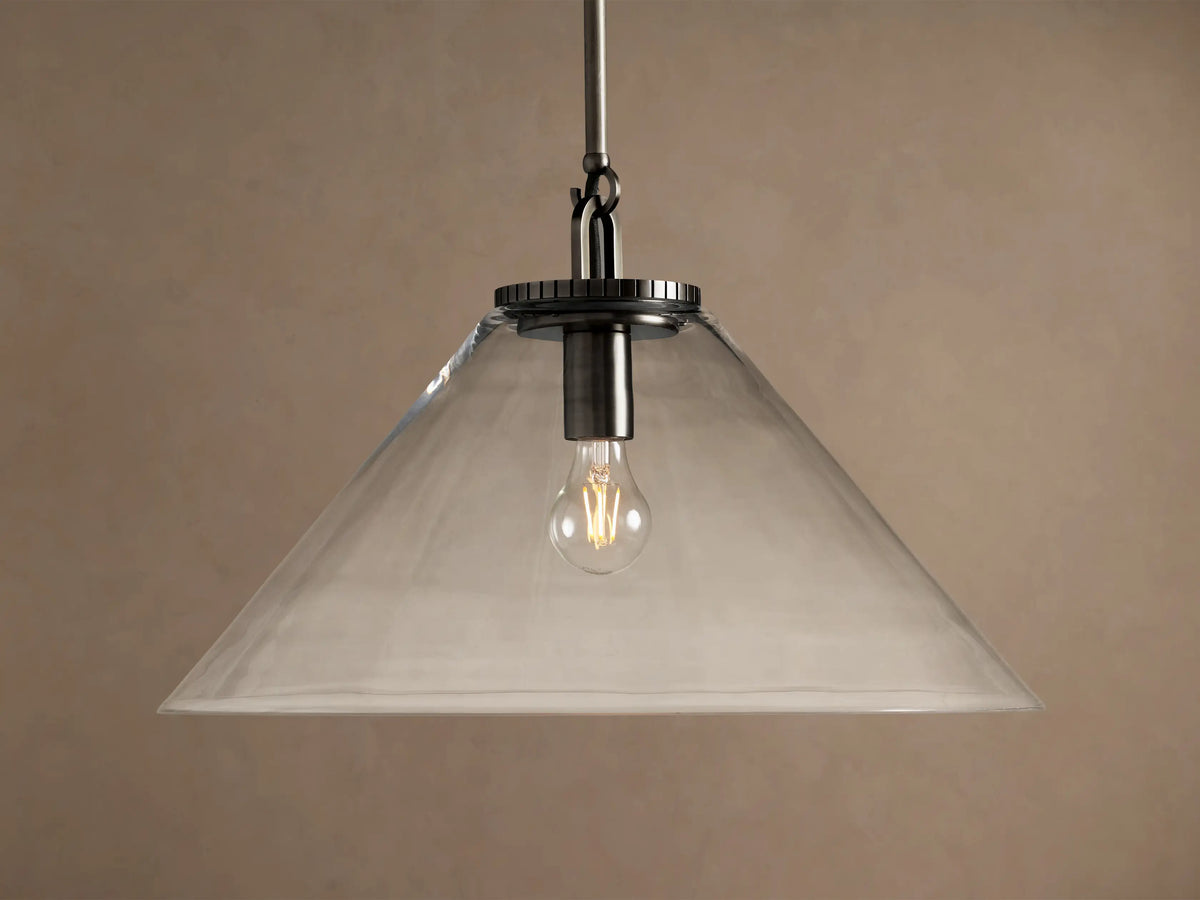 Wescott Cone Pendant light with a clear glass cone shade, dark metal rod, and visible illuminated Edison bulb.
