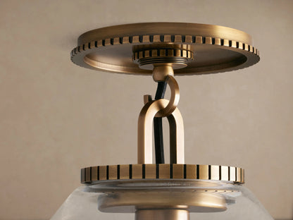 Wescott Cone Flush Mount, brass hardware with ribbed details, clear glass cone shade, central unlit bulb, mounted on ceiling.