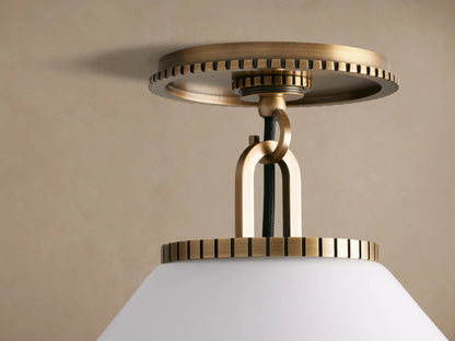Wescott Cone Flush Mount, brass finish with ribbed detailing, and a white milk glass cone shade against a beige ceiling.