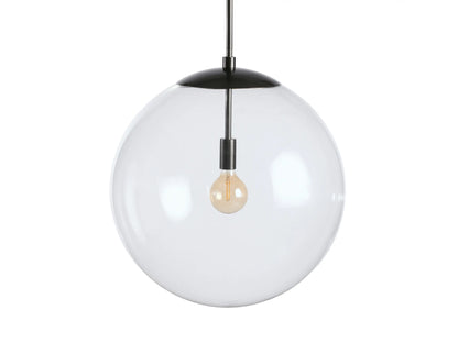 Clear glass globe pendant with visible filament bulb, sleek bronze rod, and black fabric-wrapped cord against a neutral wall.