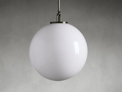 Wescott XL Globe Pendant with milk glass globe and steel fixture, suspended from a rod on a white background.