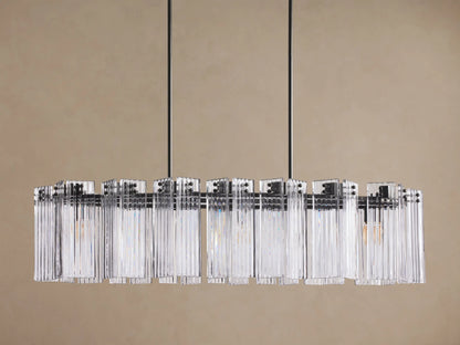 Delsie Oval Chandelier with clear rectangular glass rods and dark bronze metal frame, hanging from two black rods.