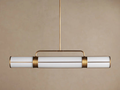 Remming Linear Chandelier: horizontal fixture with three glowing milk glass shades and burnished brass framework.