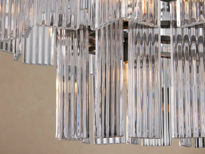 Delsie Oval Tiered Chandelier, two tiers of clear glass rods hanging from a dark metal frame, suspended by dark rods.