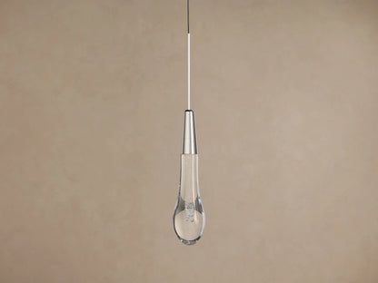 Soltaire Pendant, a nickel-finished cylinder above a clear glass teardrop with sparkling bubbles and a warm LED glow.