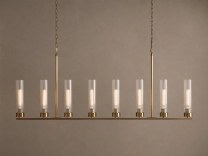 Andreas Linear Chandelier: 8-light, brass-finished, horizontal bar with clear cylindrical glass shades, exposing filament bulbs, hanging.
