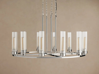 Andreas Round Chandelier, polished nickel finish, round frame, 12 glowing bulbs in clear fluted glass shades, suspended by chains.