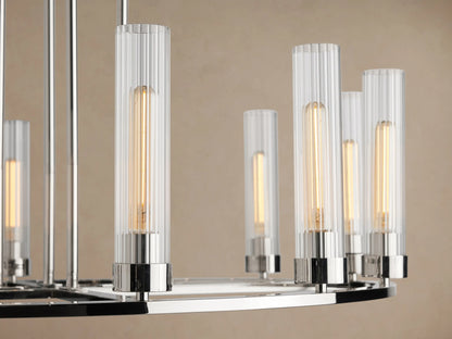 Polished nickel Andreas Round Chandelier with 10 clear fluted glass shades, each housing an exposed filament bulb. Suspended by chains.