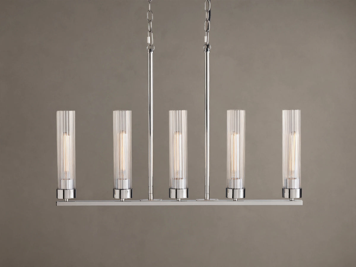 Andreas Linear Chandelier, 5-light, with ribbed clear glass shades, filament bulbs, & polished chrome finish, hanging straight-on.