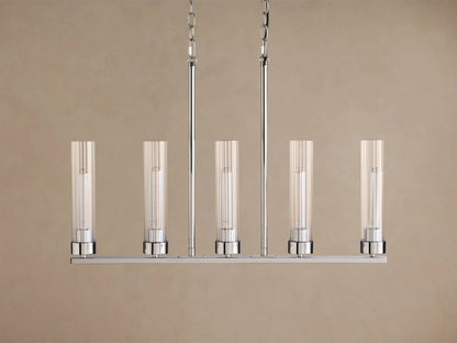 Andreas Linear Chandelier, 5-light, with ribbed clear glass shades, filament bulbs, & polished chrome finish, hanging straight-on.