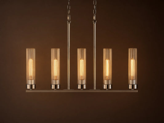 Andreas Linear Chandelier, 5-light, with ribbed clear glass shades, filament bulbs, & polished chrome finish, hanging straight-on.