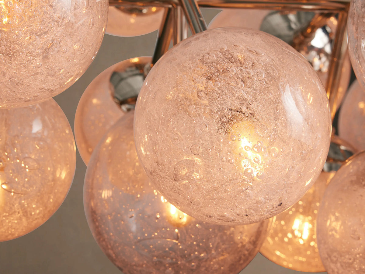 Mandoza Linear Chandelier: Polished nickel frame suspending many clear and frosted hand-blown glass globes horizontally.