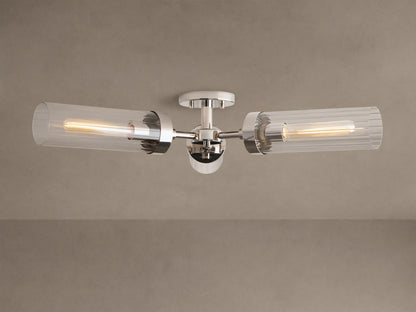 Andreas Flush Mount, polished nickel, with two horizontal clear ribbed glass shades, showcasing glowing filament bulbs.